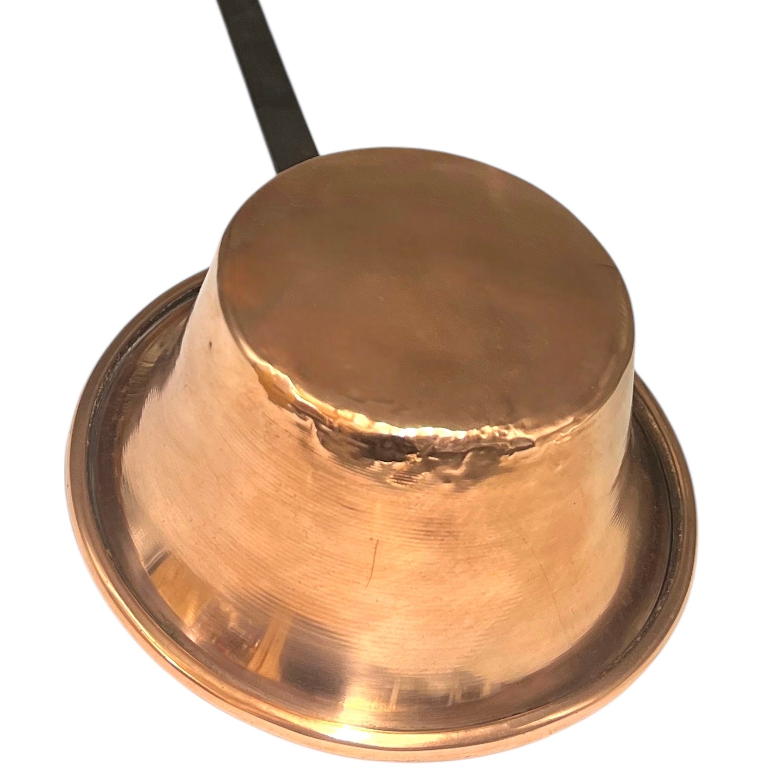 Close up of French vintage copper ladle pan with a black handle on a white background