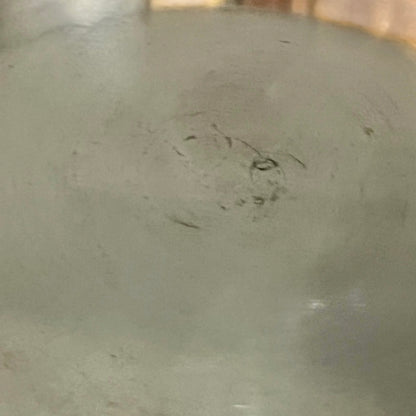 inside of copper pan with tin lining on a white background