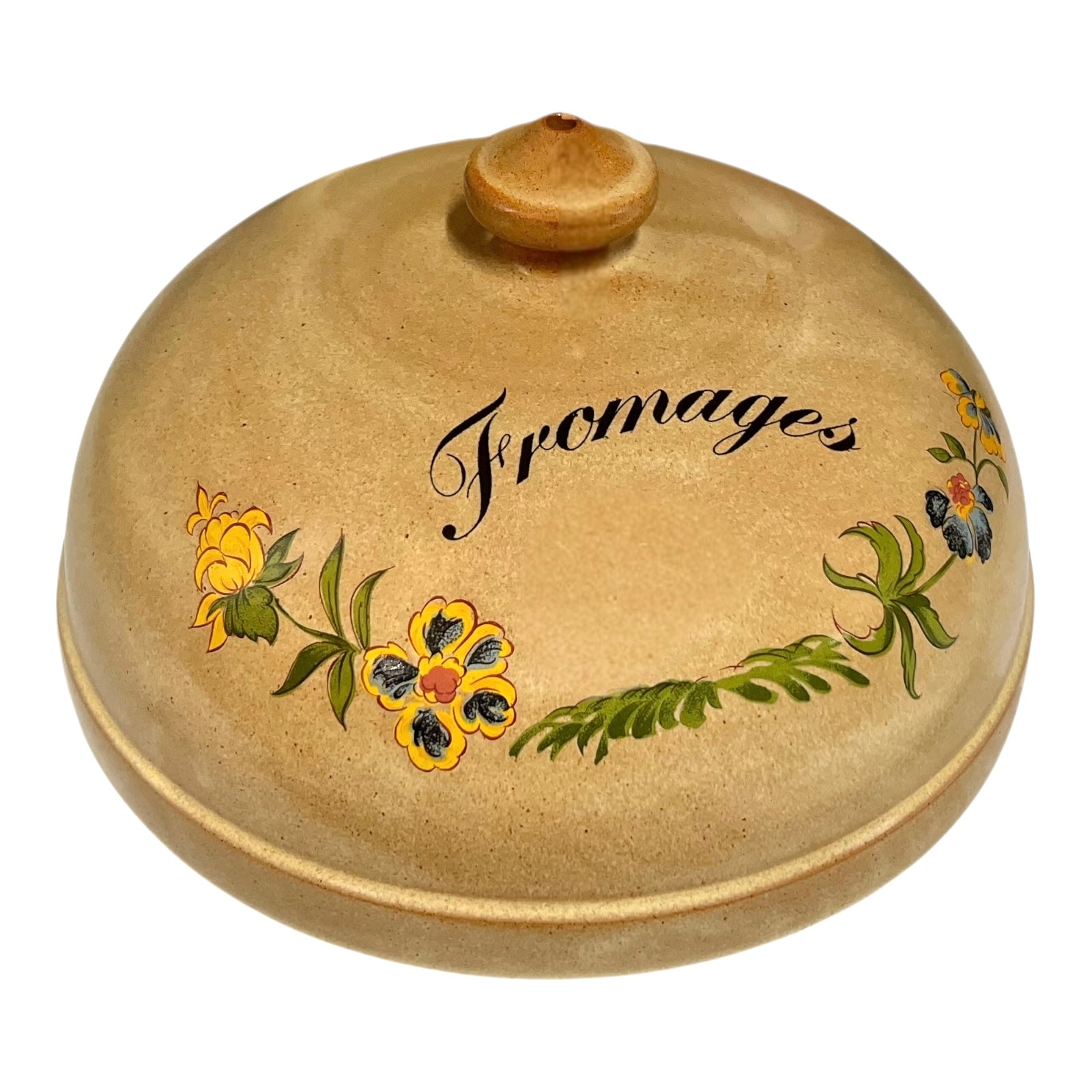 Decorative ceramic cheese dome with floral designs and 'Fromages' text on a white background