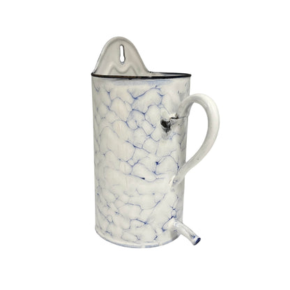 A vintage-style enamel pitcher planter with a white body, blue crackle pattern, and a white handle, shown on a plain white background.