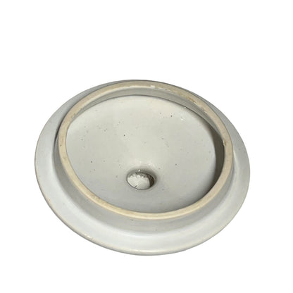close up of a French table bin on a white background 