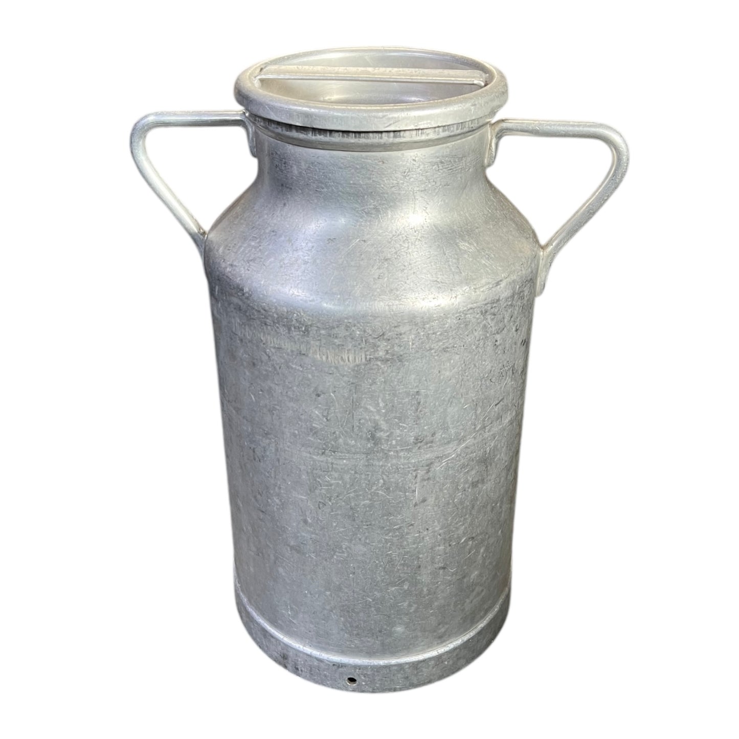 Metal milk churn on a white background