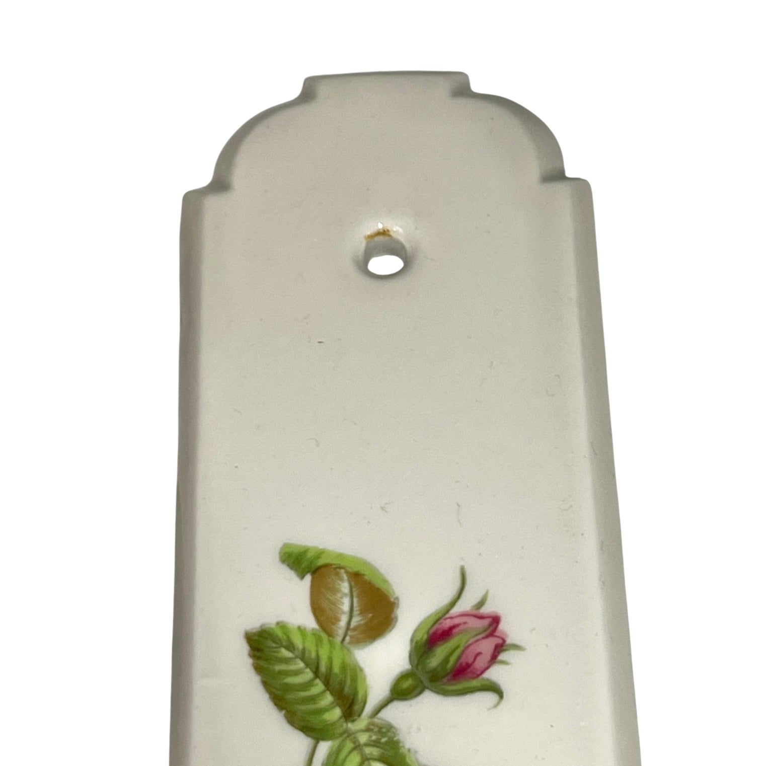 Close up of a finger push plate on a white background