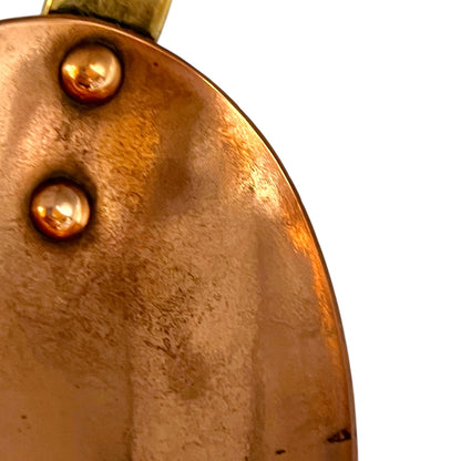 copper rivets on copper spoon