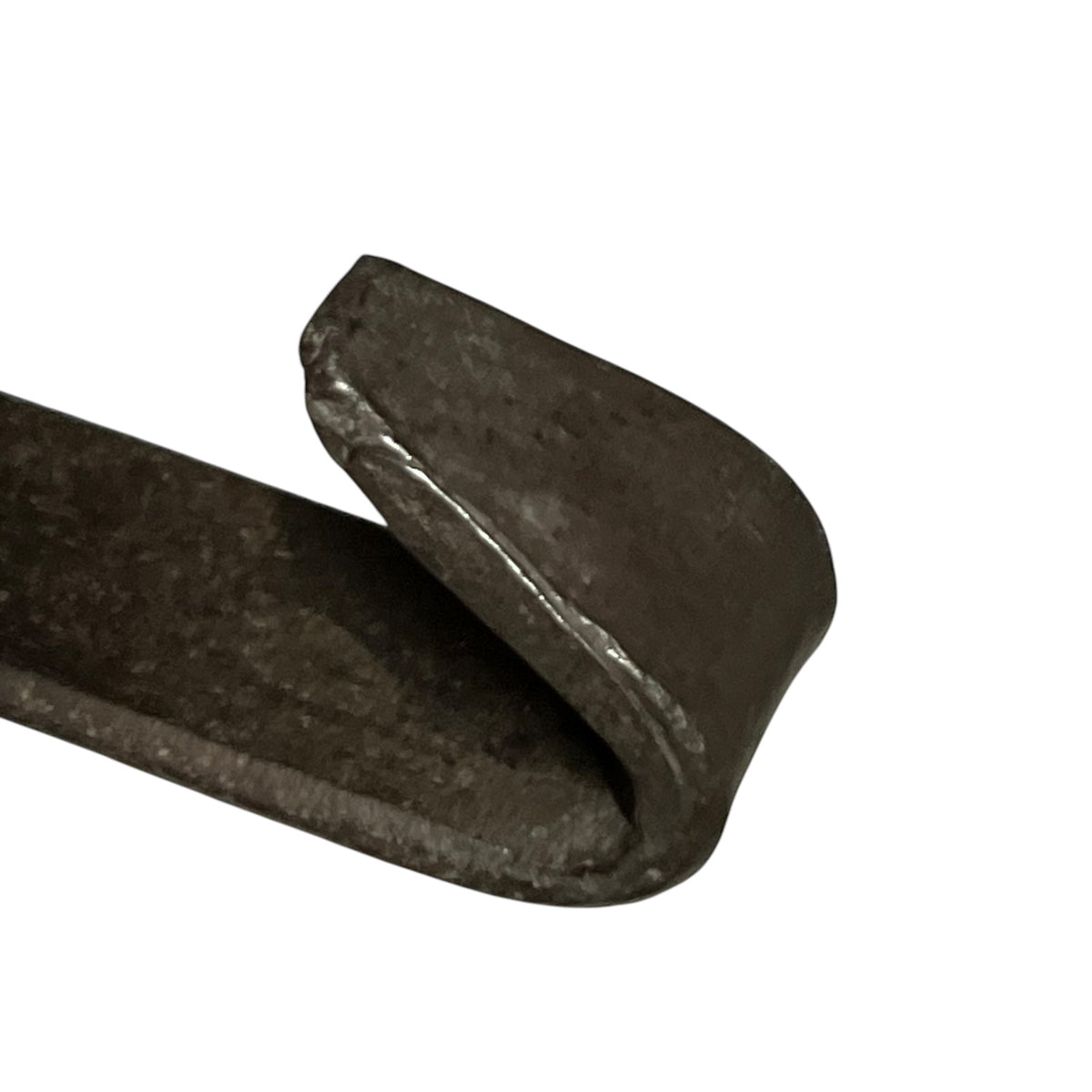 A close-up of a dark metal U-shaped bracket or hook with a textured, forged appearance, isolated on a white background.