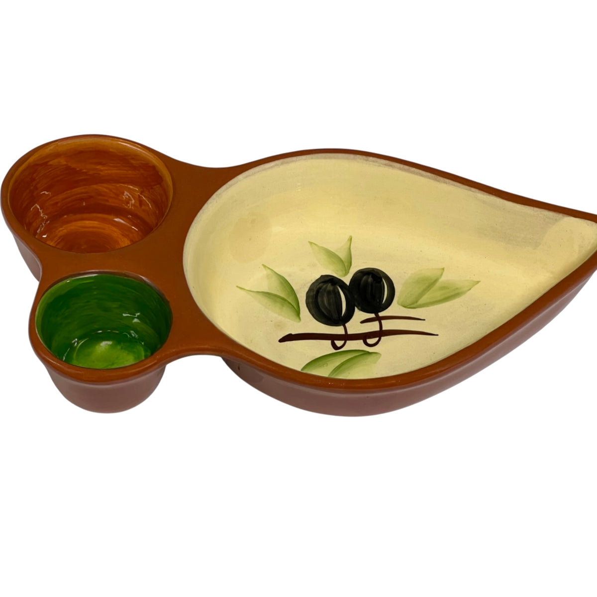 A ceramic three-compartment serving dish with a leaf-shaped main compartment, a small oval bowl, and a small round cup. The main compartment is cream-colored with a painted olive branch and black olives motif, while the two side compartments are brown with one green interior.