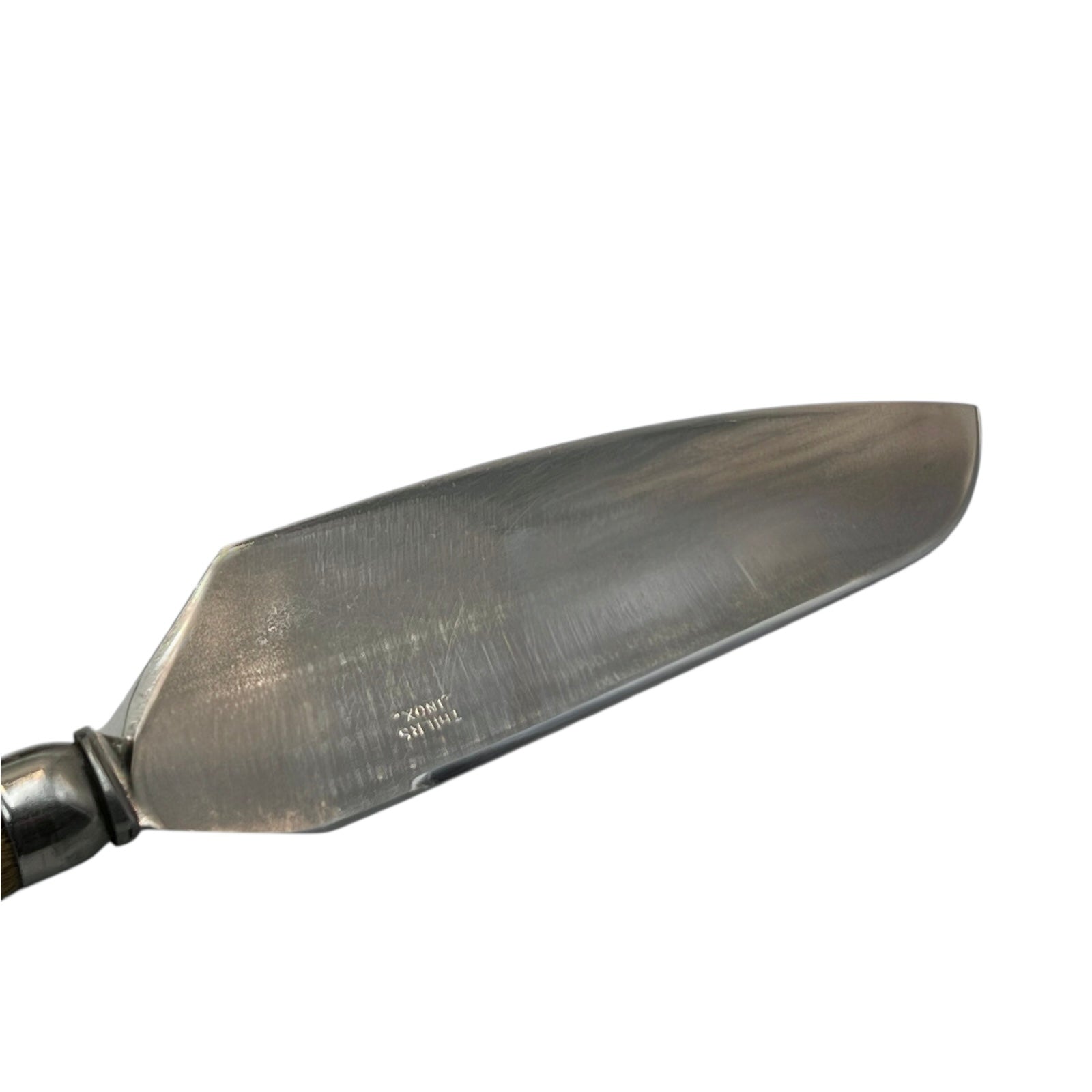 Metal spatula on a white background