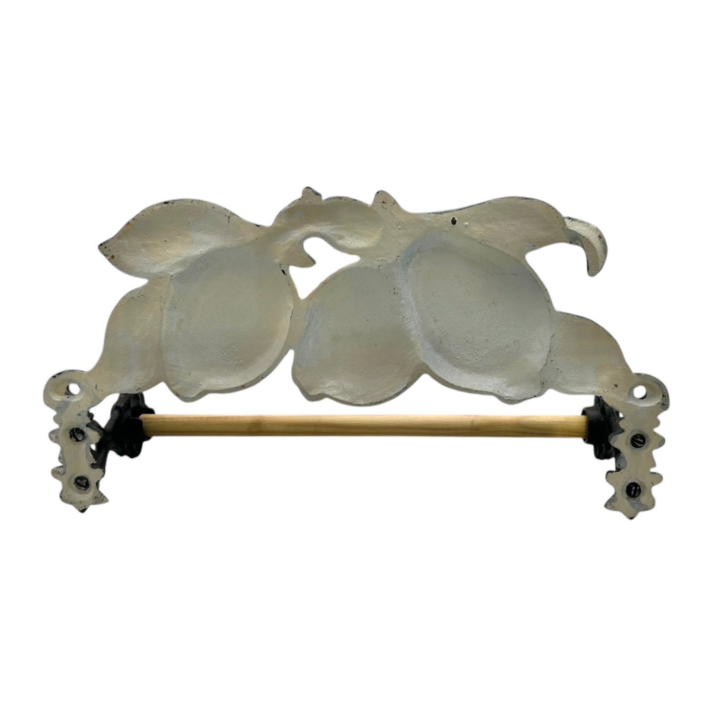 close up of a cast iron kitchen roll holder on a white background 