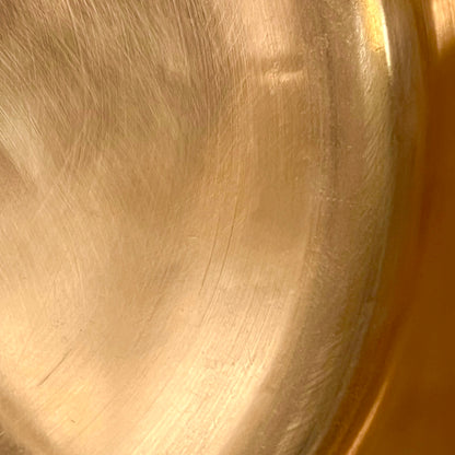 Close up of inside a copper basin 