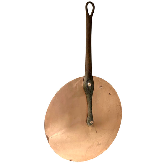 Authentic vintage French copper pan lid with cast iron handle and new tin lining  on a white background