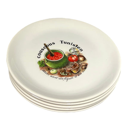 Set of ceramic plates with Tunisian couscous design on a white background