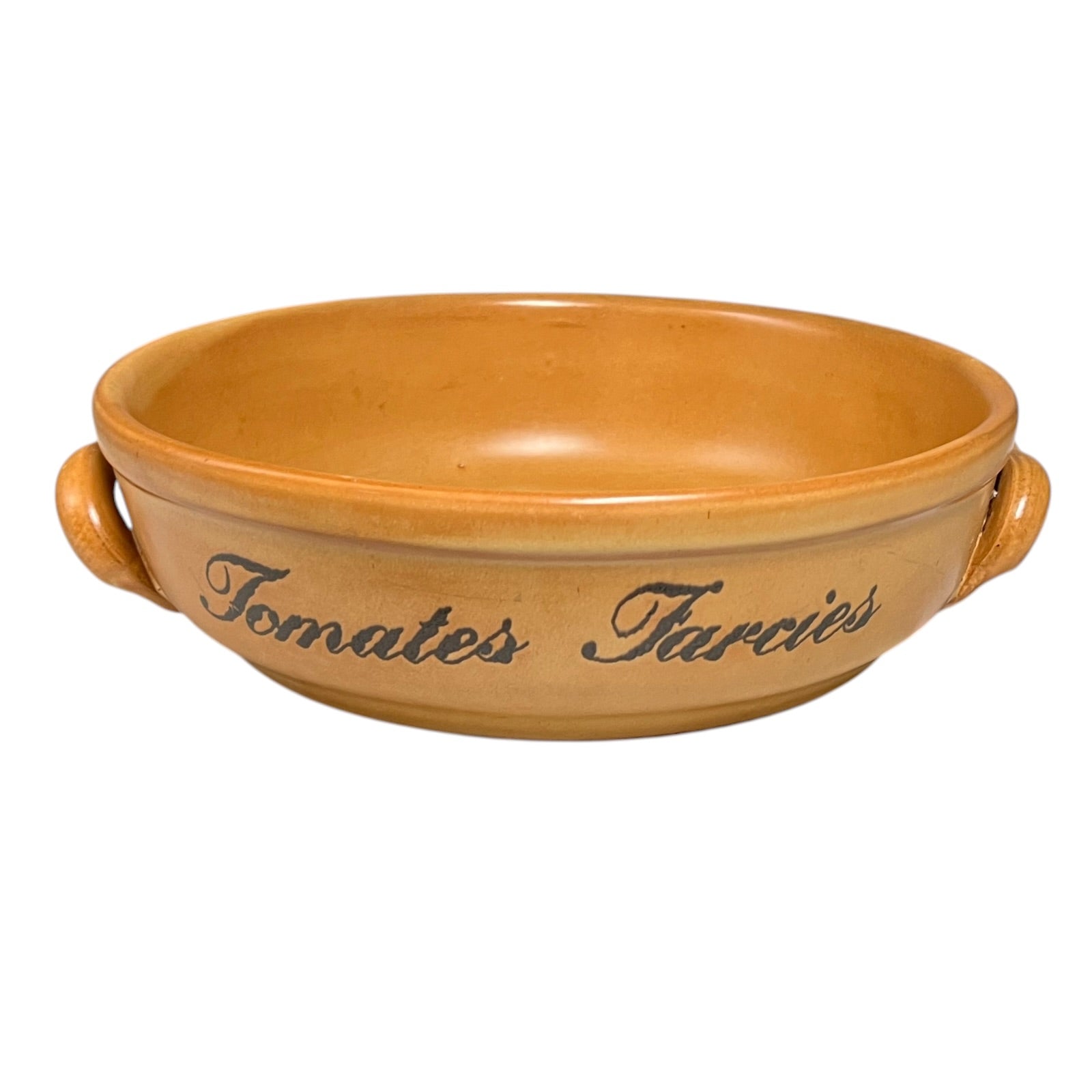Ceramic dish with handles and 'Tomates Farcies' text on a white background