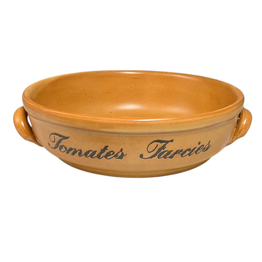 Ceramic dish with handles and 'Tomates Farcies' text on a white background