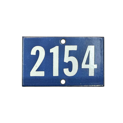 blue and white enamel French door or house number 2154 on a white background 