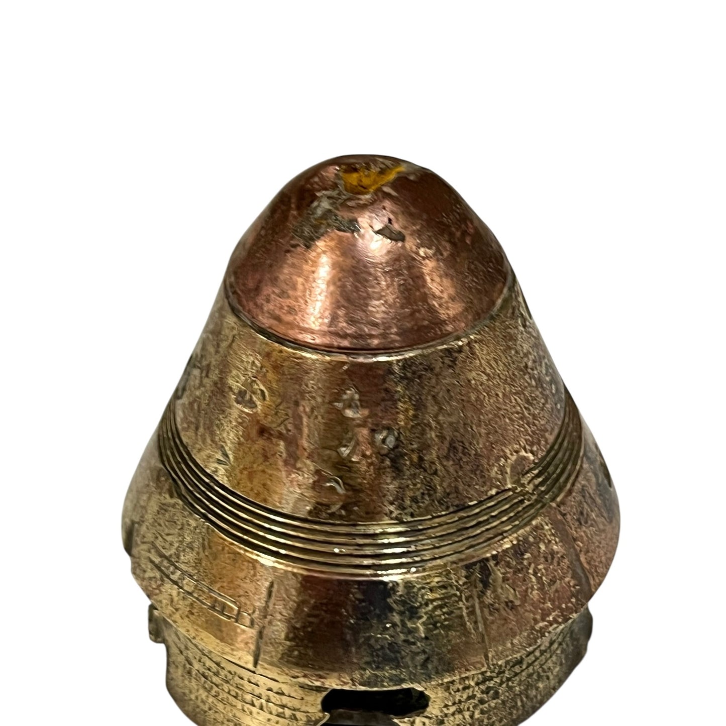 WW1 relic brass fuse number 102, ideal as a paperweight n a white background