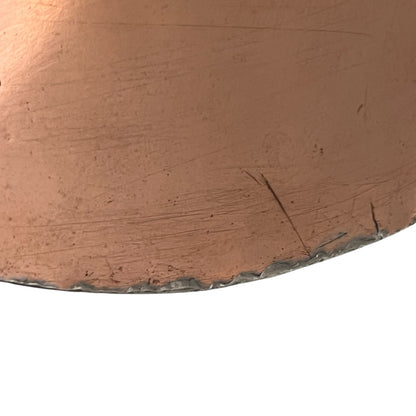 edge of copper pan lid