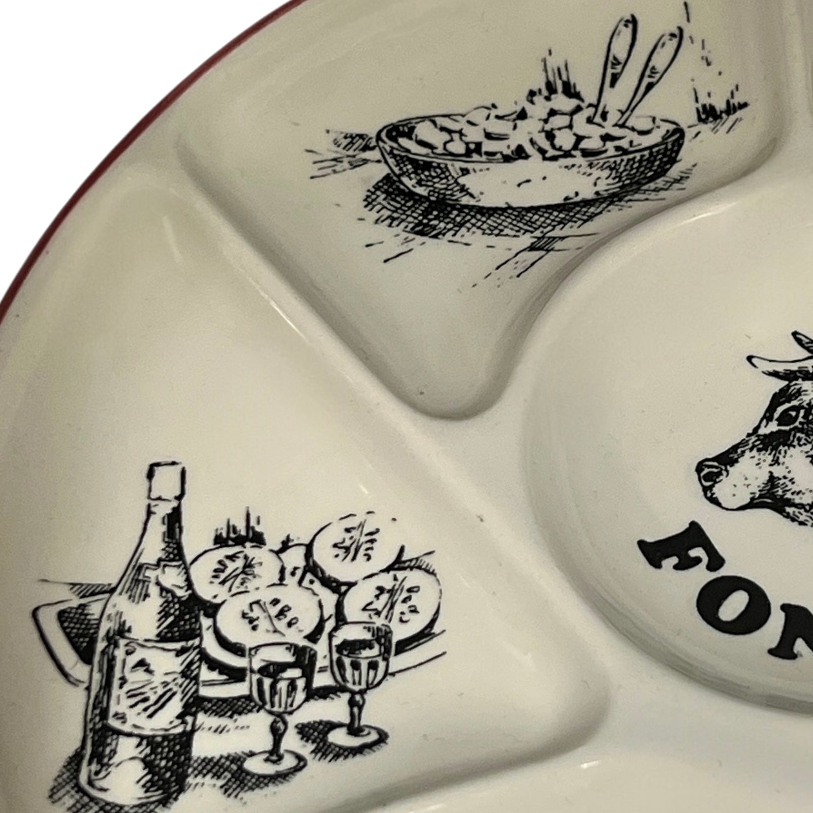 White ceramic platter with black illustrations of food and drink, featuring the word 'Fondue.