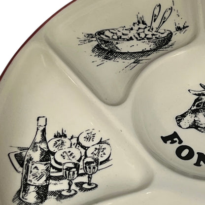 White ceramic platter with black illustrations of food and drink, featuring the word 'Fondue.