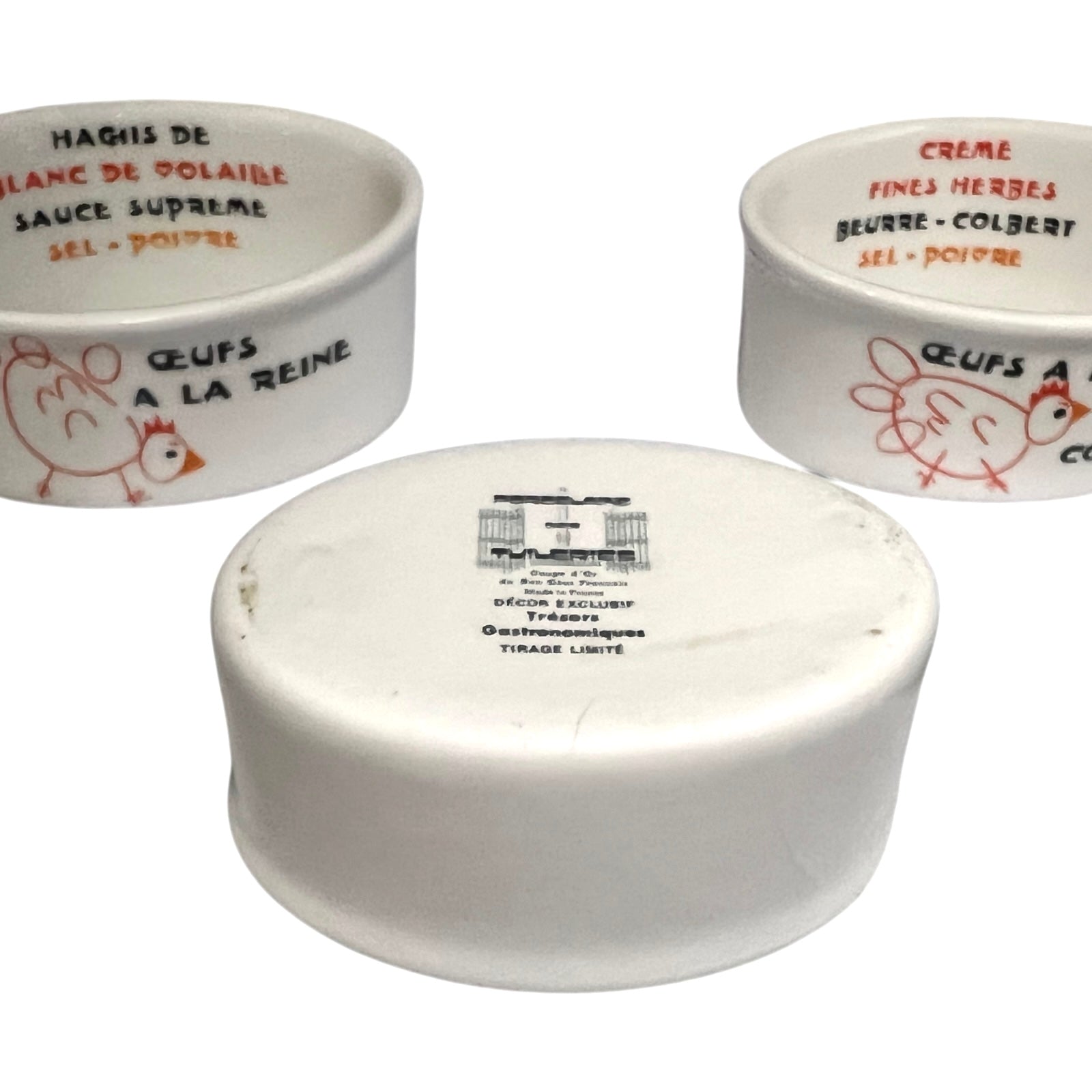 Three ceramic ramekins with text and chicken illustrations on a white background