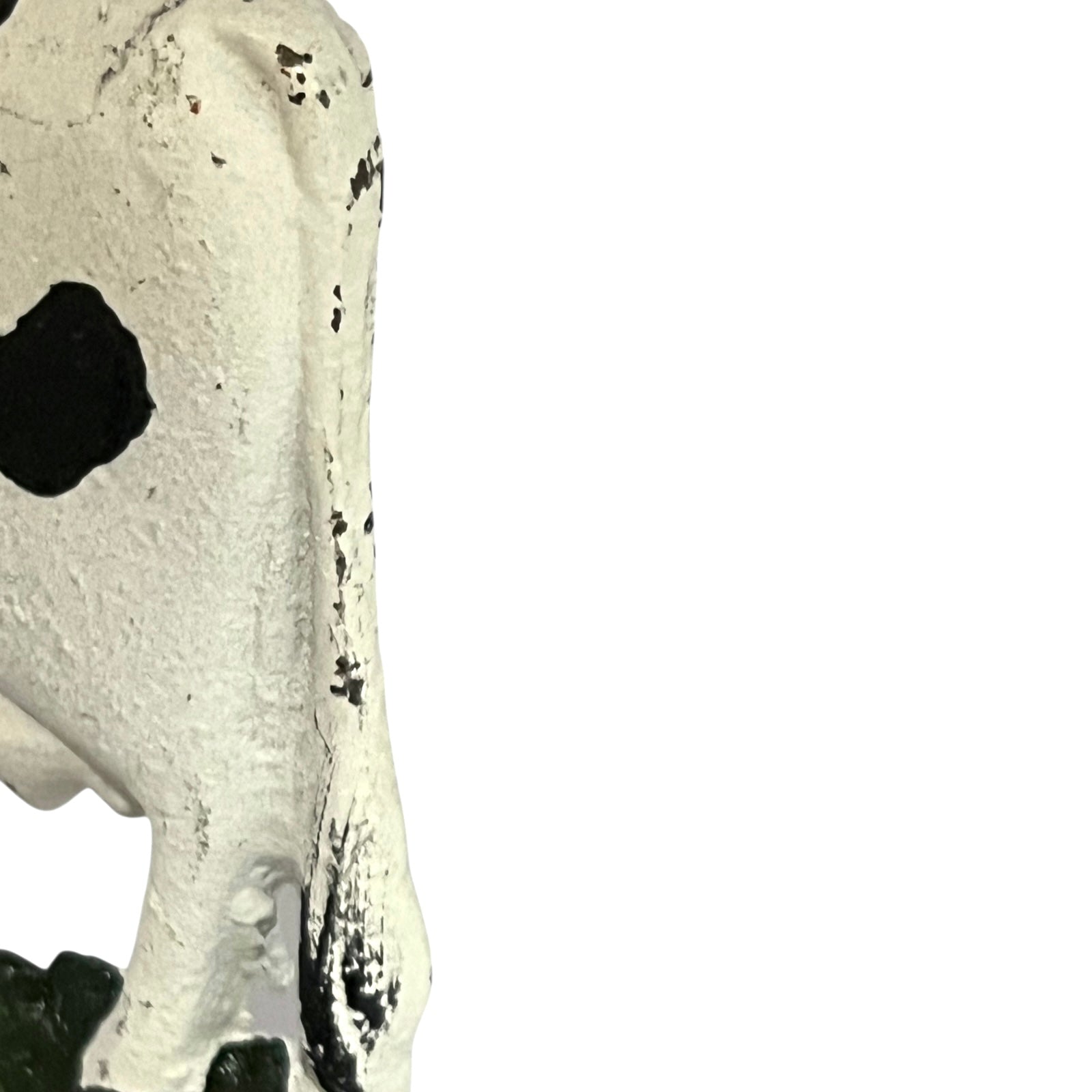 Close-up of a cow-shaped toiler paper roll holder  on a white background