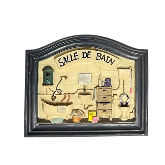 Decorative wall art of a vintage bathroom scene with 'SALLE DE BAIN' text.