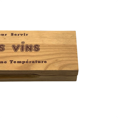 Wooden wine temperature control block with engraved text on a white background