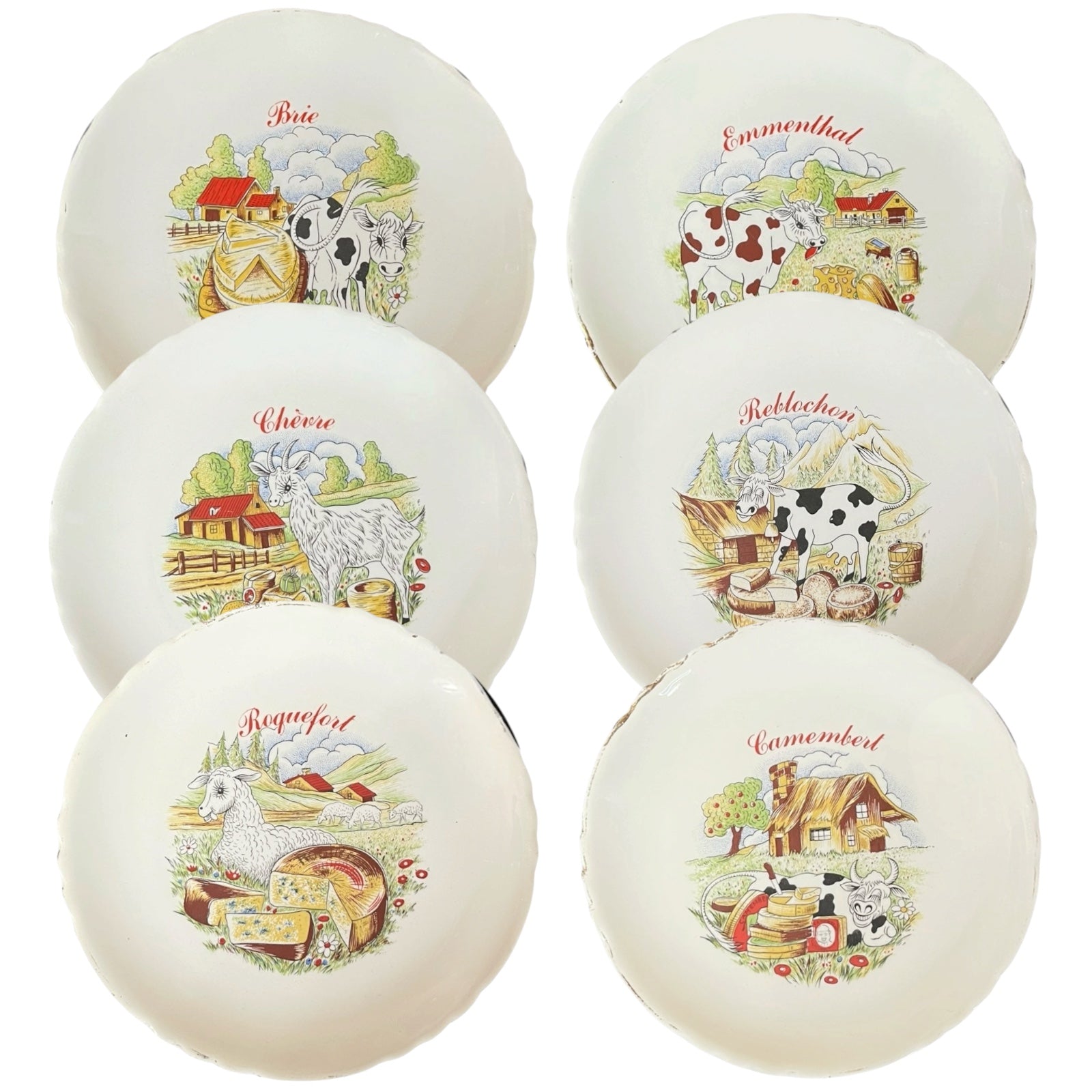 Set of ceramic cheese plates with farm-themed designs on a white background
