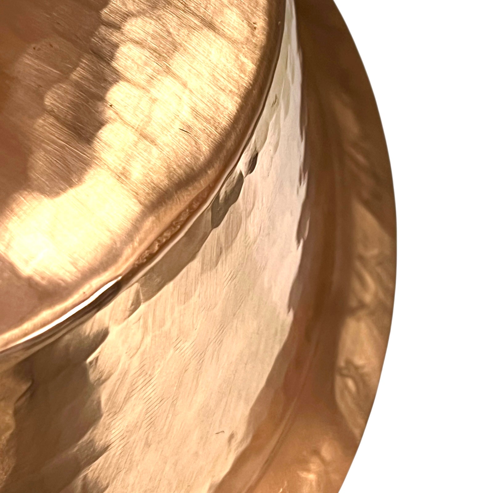 Close-up of a copper sink on a white background