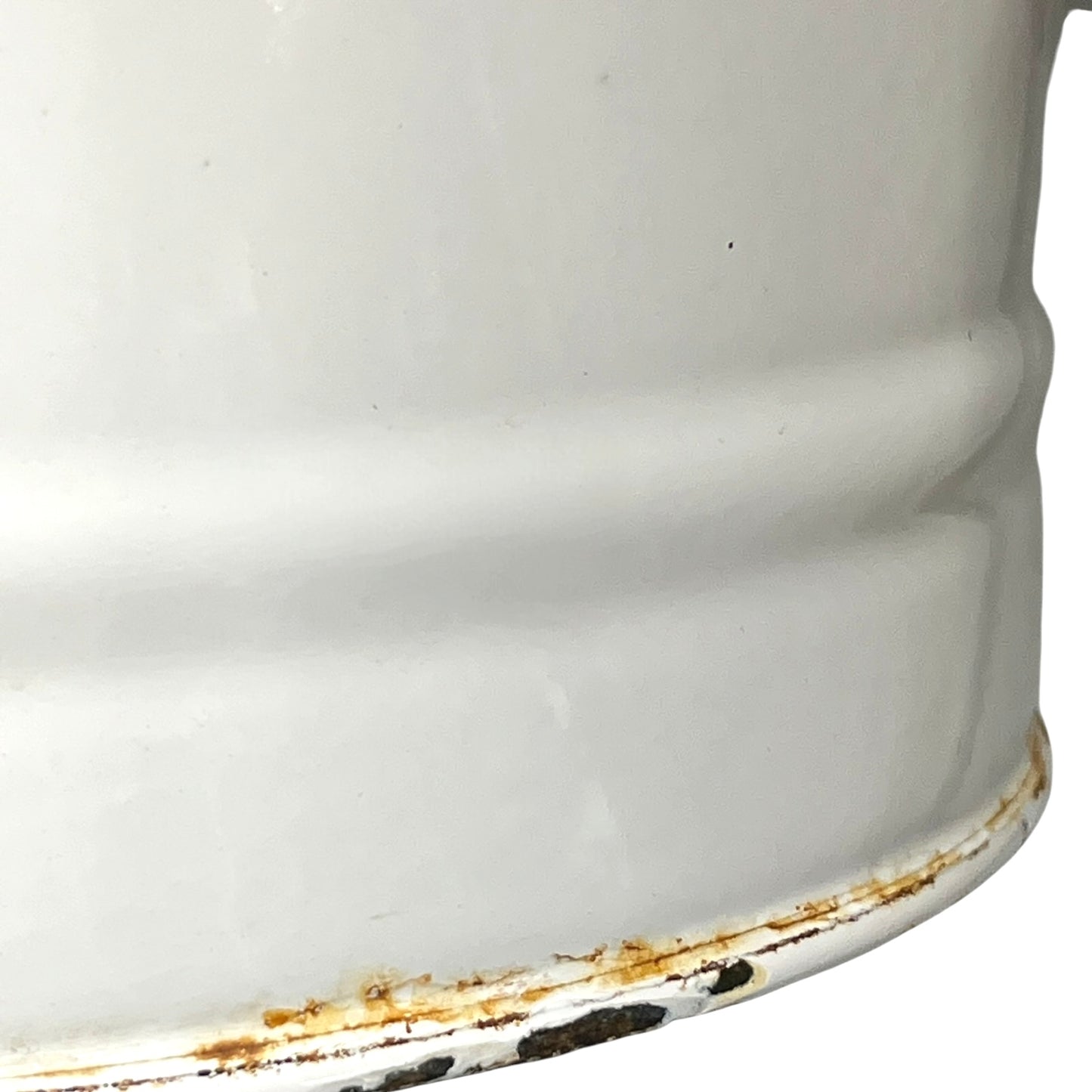 Close up of a vintage enamel lidded white bucket on a white background