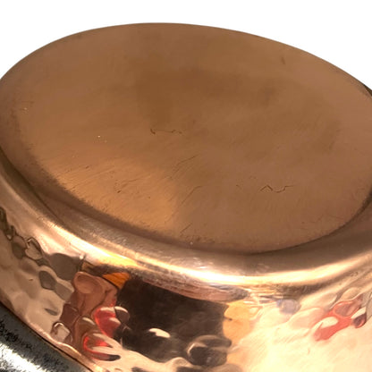 base of copper saucepan 