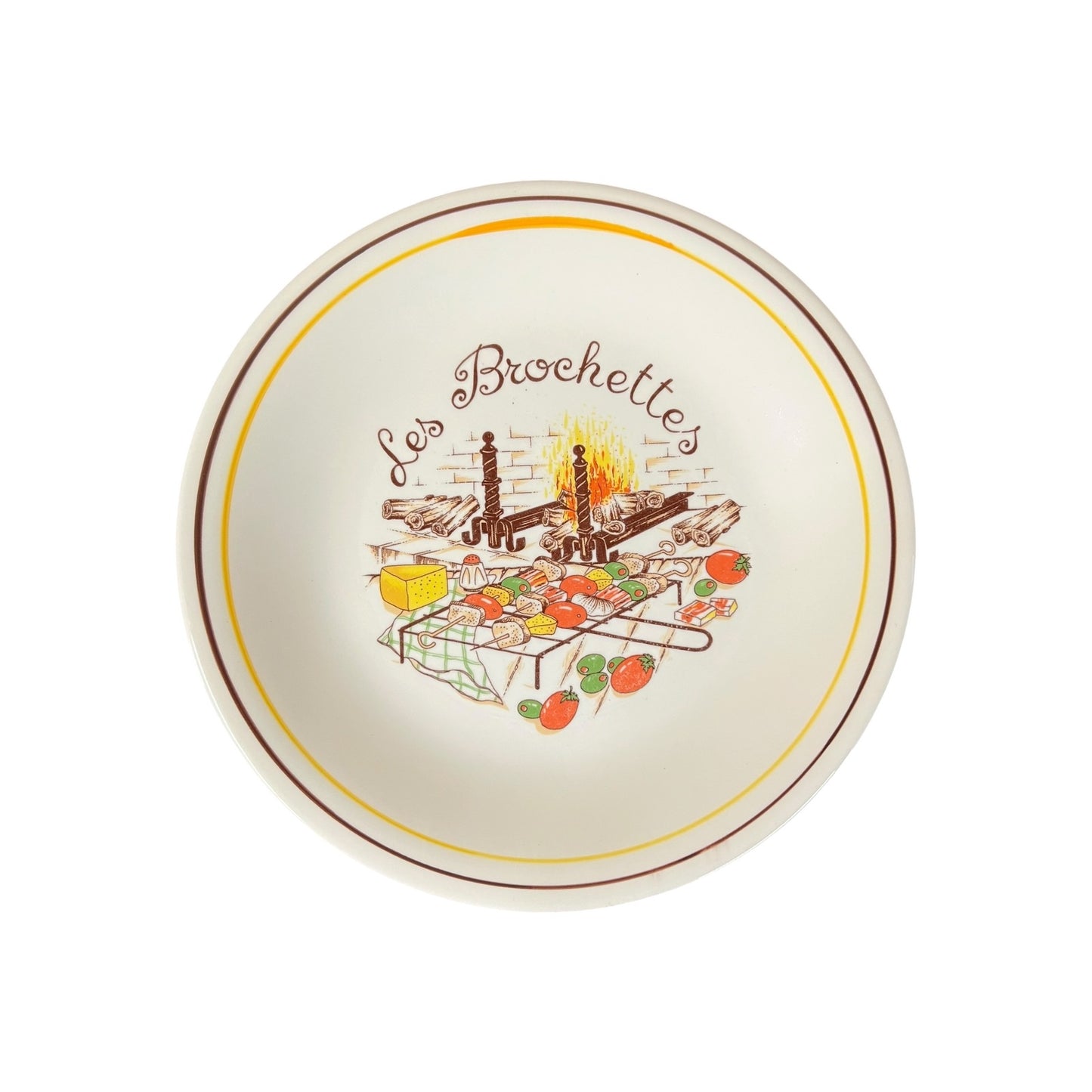 Decorative plate with 'Les Brochettes' design on a white background