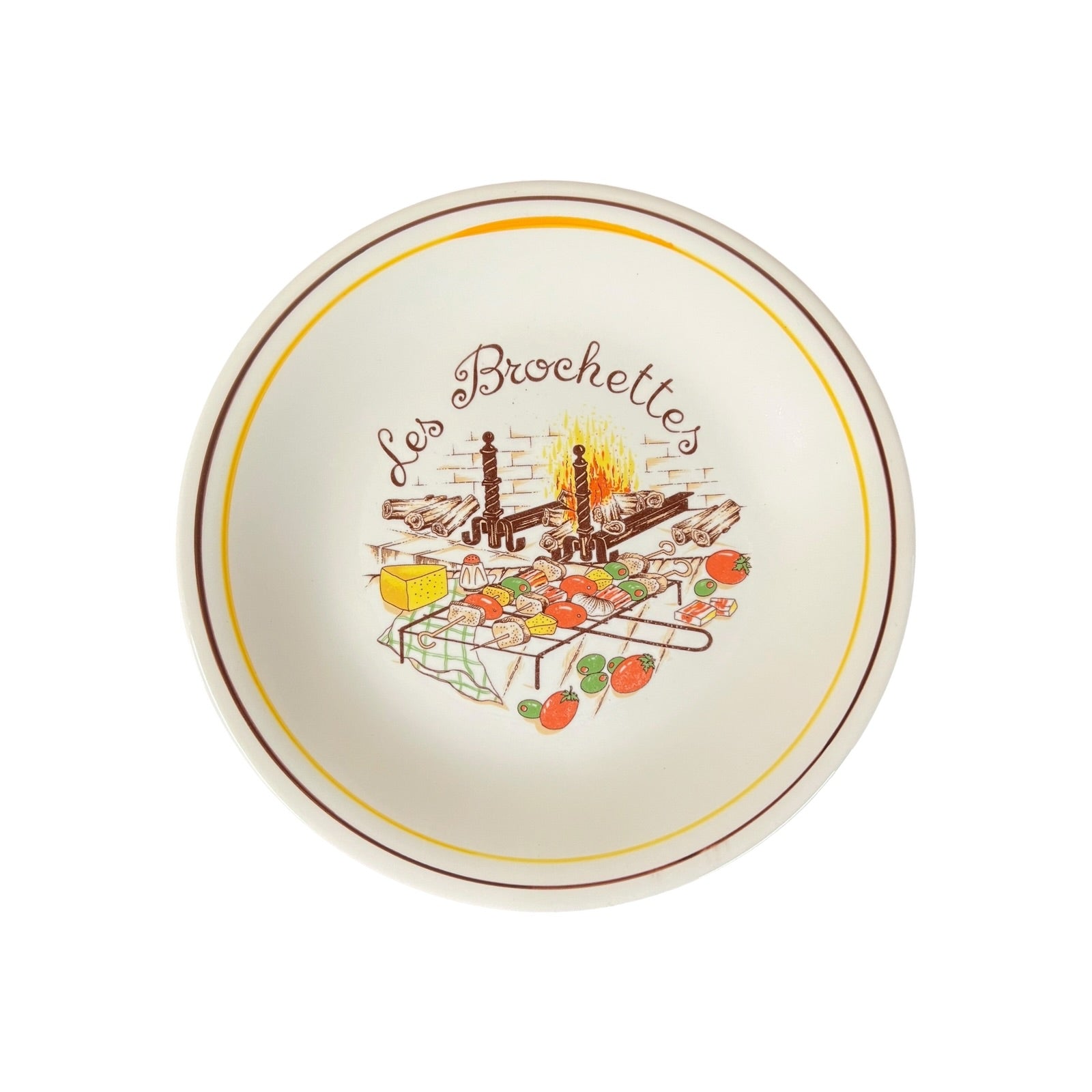 Decorative plate with 'Les Brochettes' design on a white background