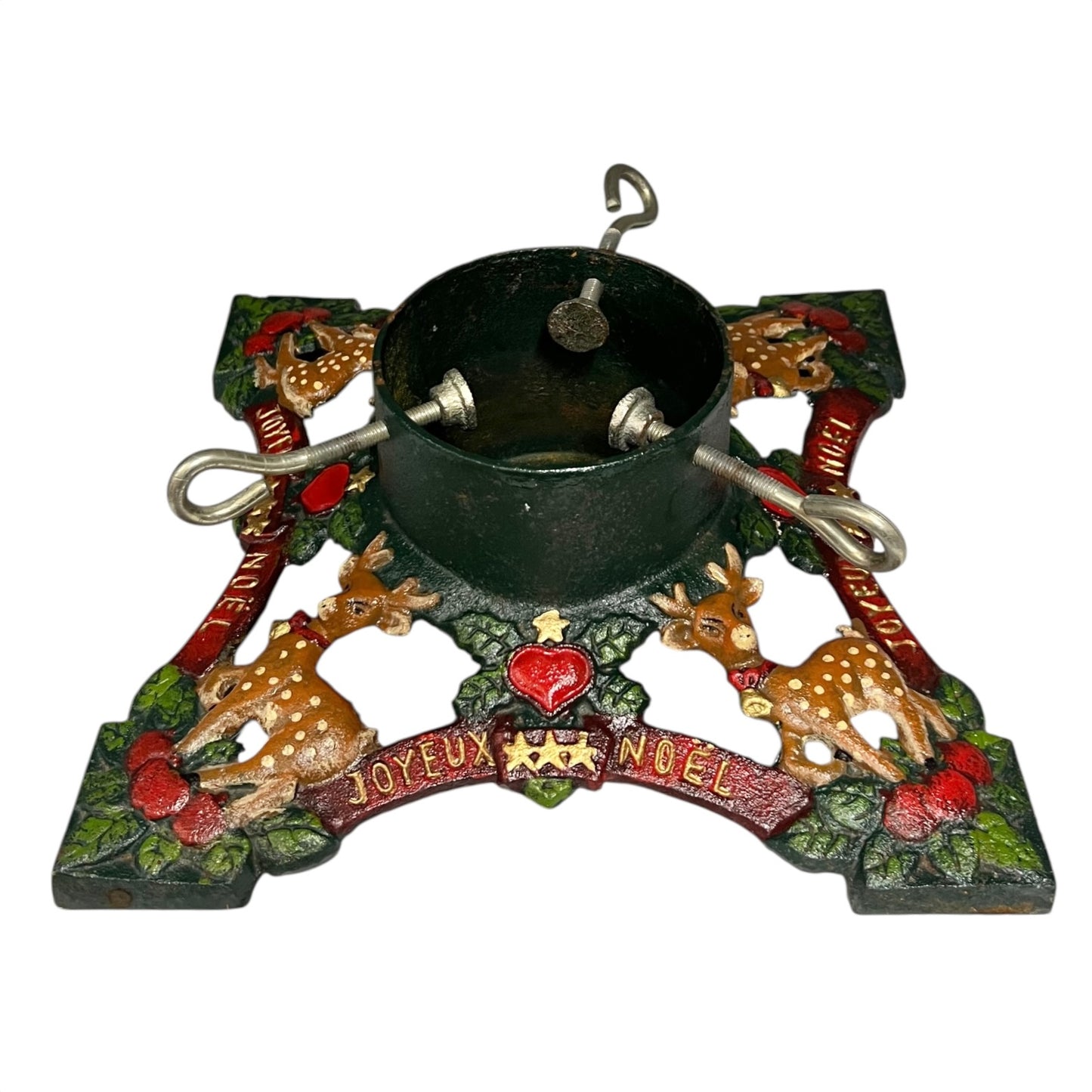 Decorative Christmas Tree holder with reindeer, berries, and 'Joyeux Noel' text on a white background