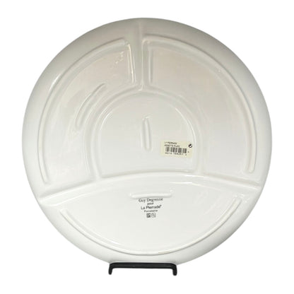 White sectioned plate with a label on a white background