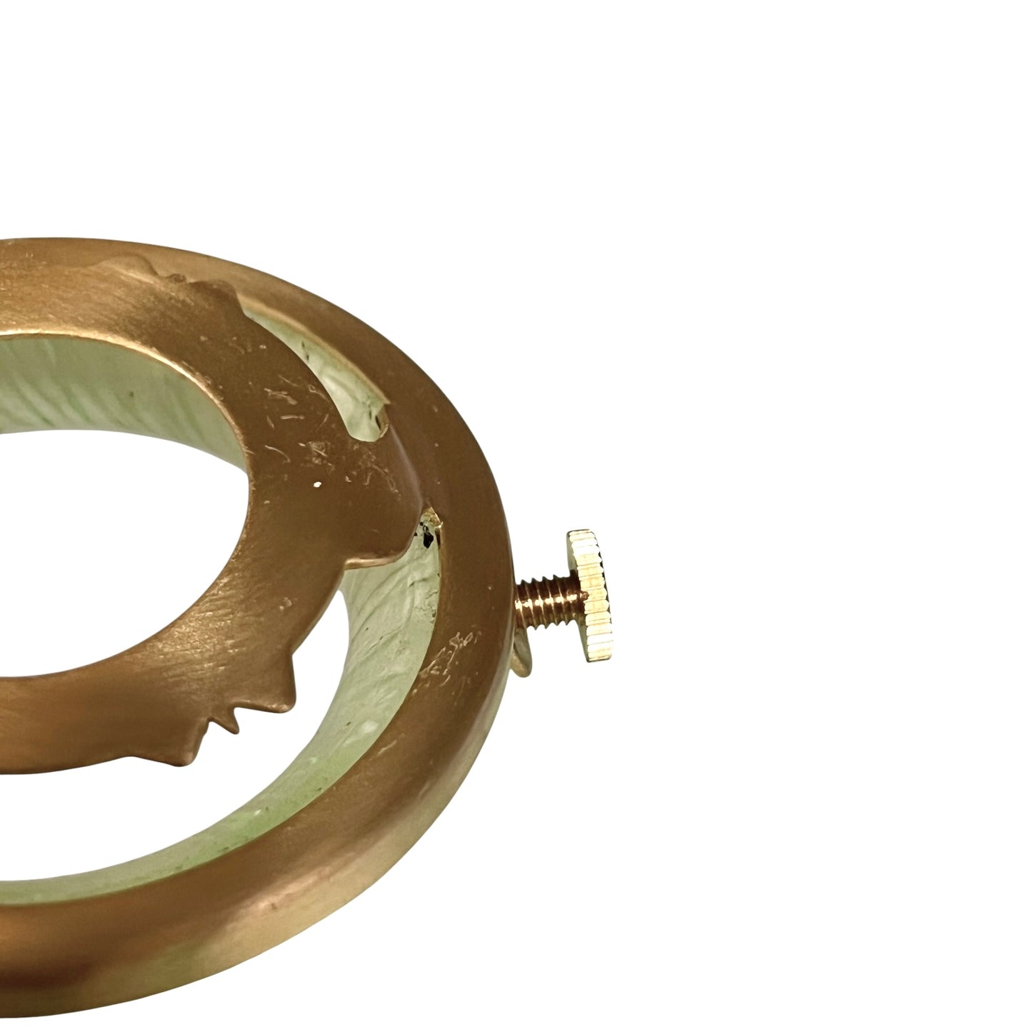 A close-up of a brass-colored circular ring or collar with a small threaded screw and knurled adjustment head, shown on a plain white background.