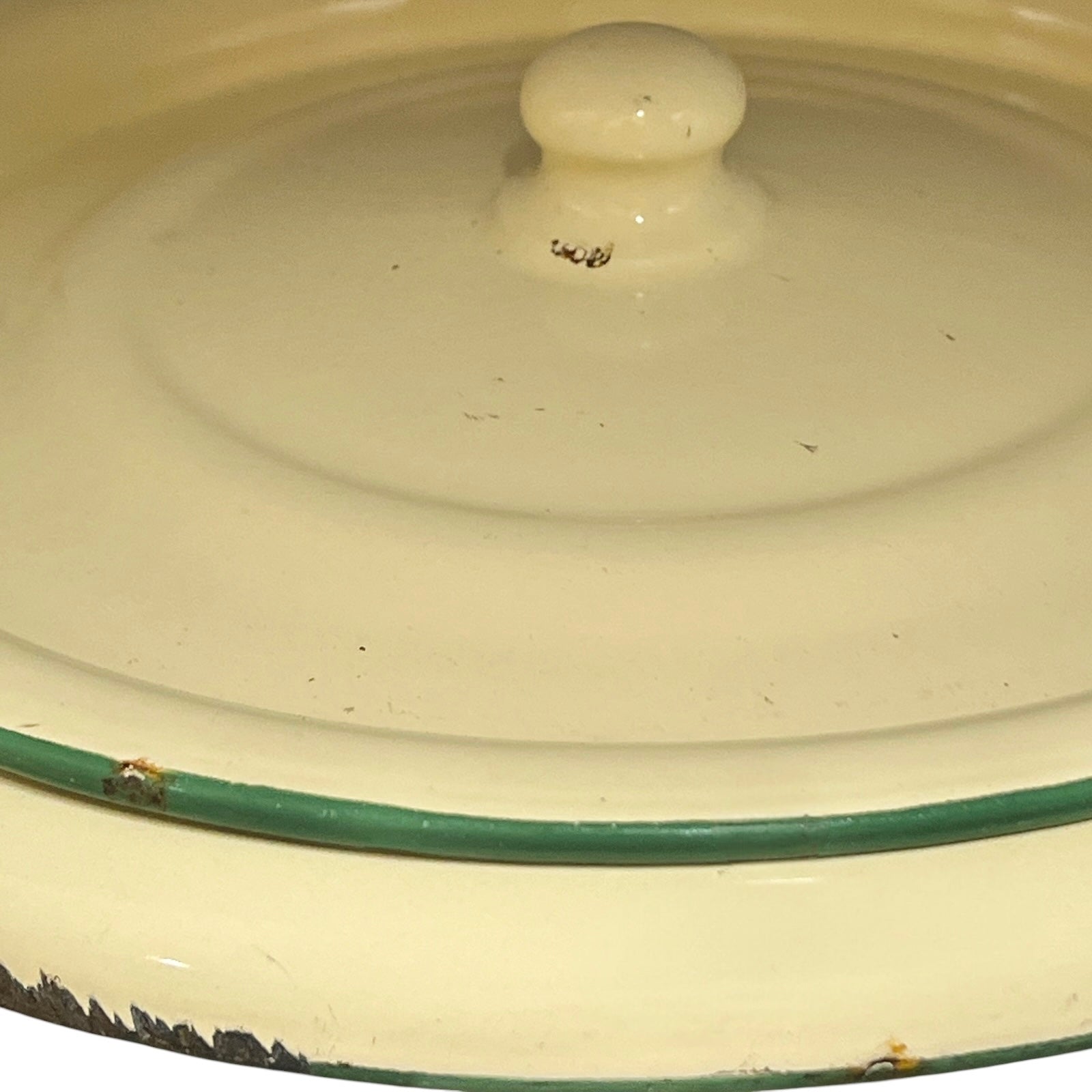 Close up of a French enamel bucket on a white background 