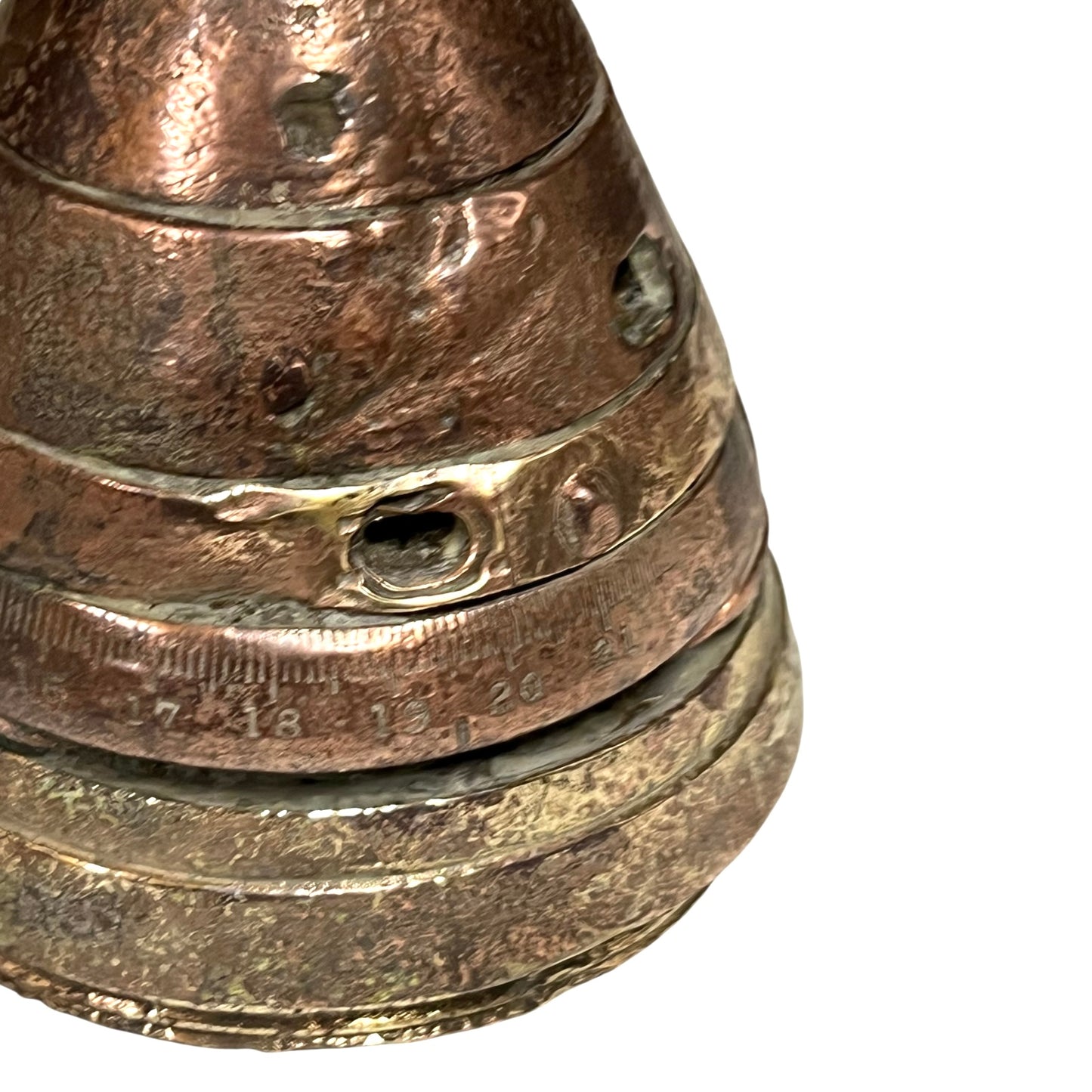 Close up of WW1 brass fuse on a white background