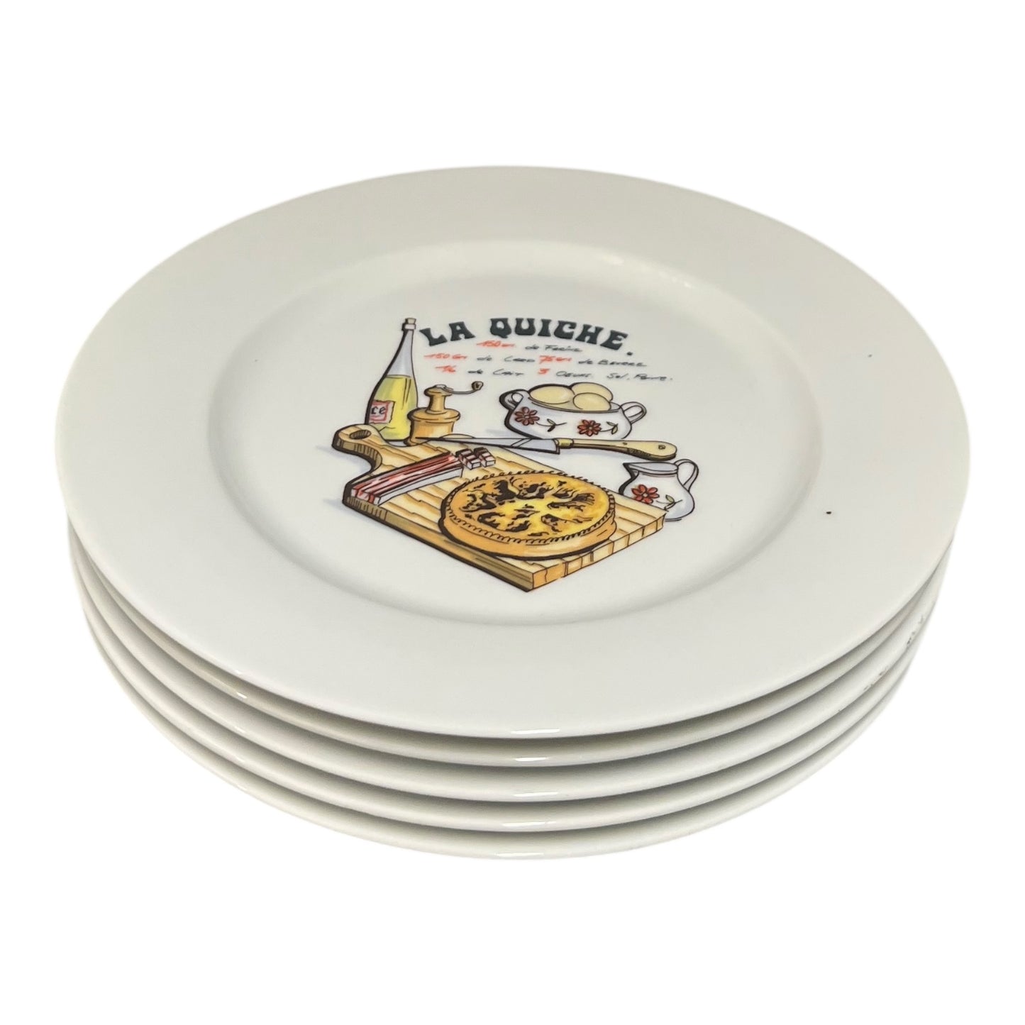 Set of ceramic plates with 'La Quiche' design on a white background