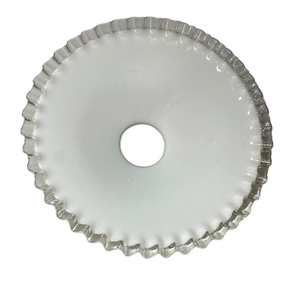 French vintage milk glass opaline lampshade with a clear trimmed frilly edge and a brass bulb holder ideal for a French country style set on a white background
