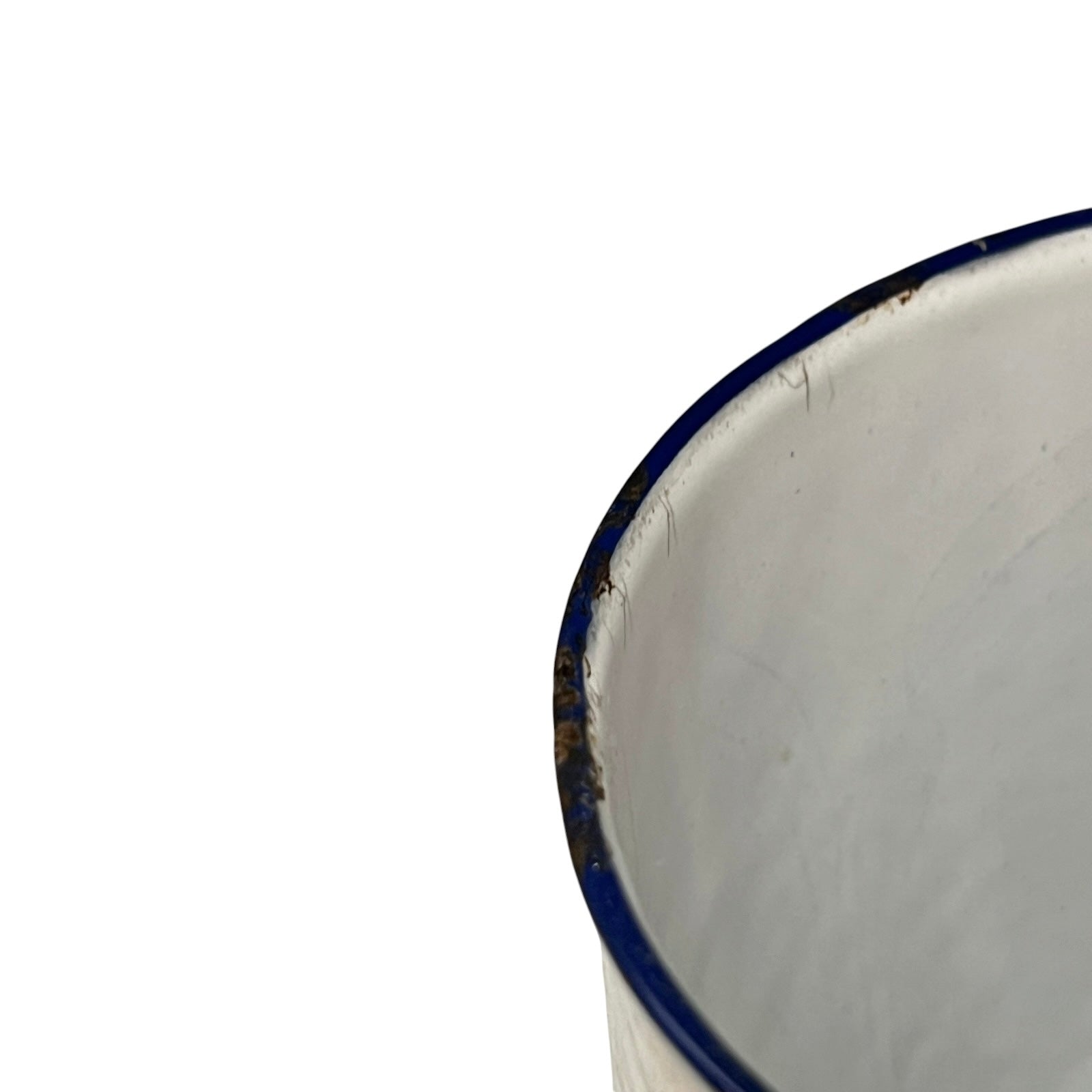 Close up of a French enamel vintage garden wall mounted planter or kitchen bathroom storage pot, on a white background 