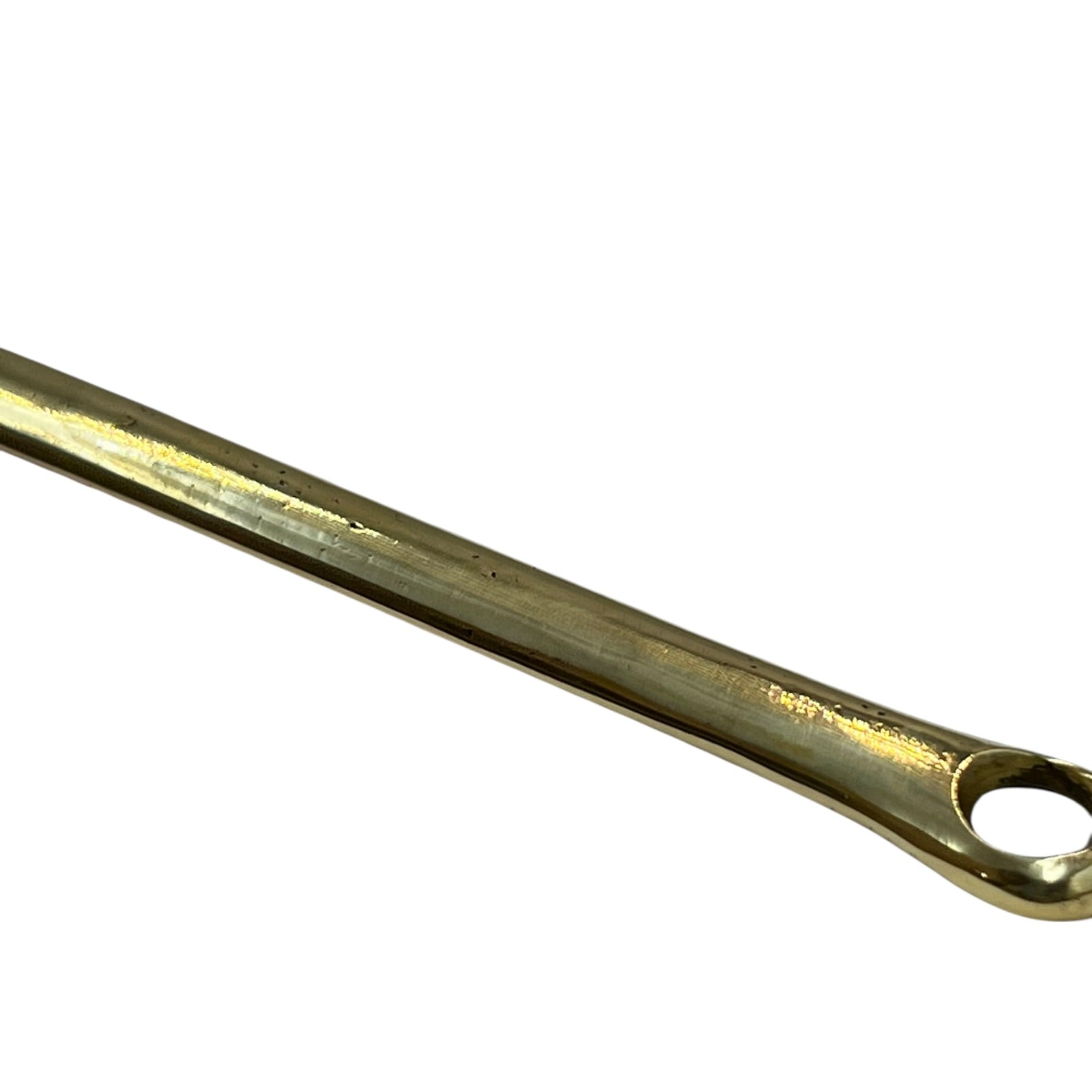 Brass pan handle on a white background 