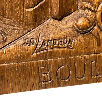 J.C. Lardeux signature on a wooden painting 