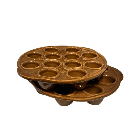 A pair of brown French vintage ceramic escargot plates, each featuring 12 holes and side handles, perfect for French recipes or adding charm to a farmhouse country kitchen, displayed on a white background.