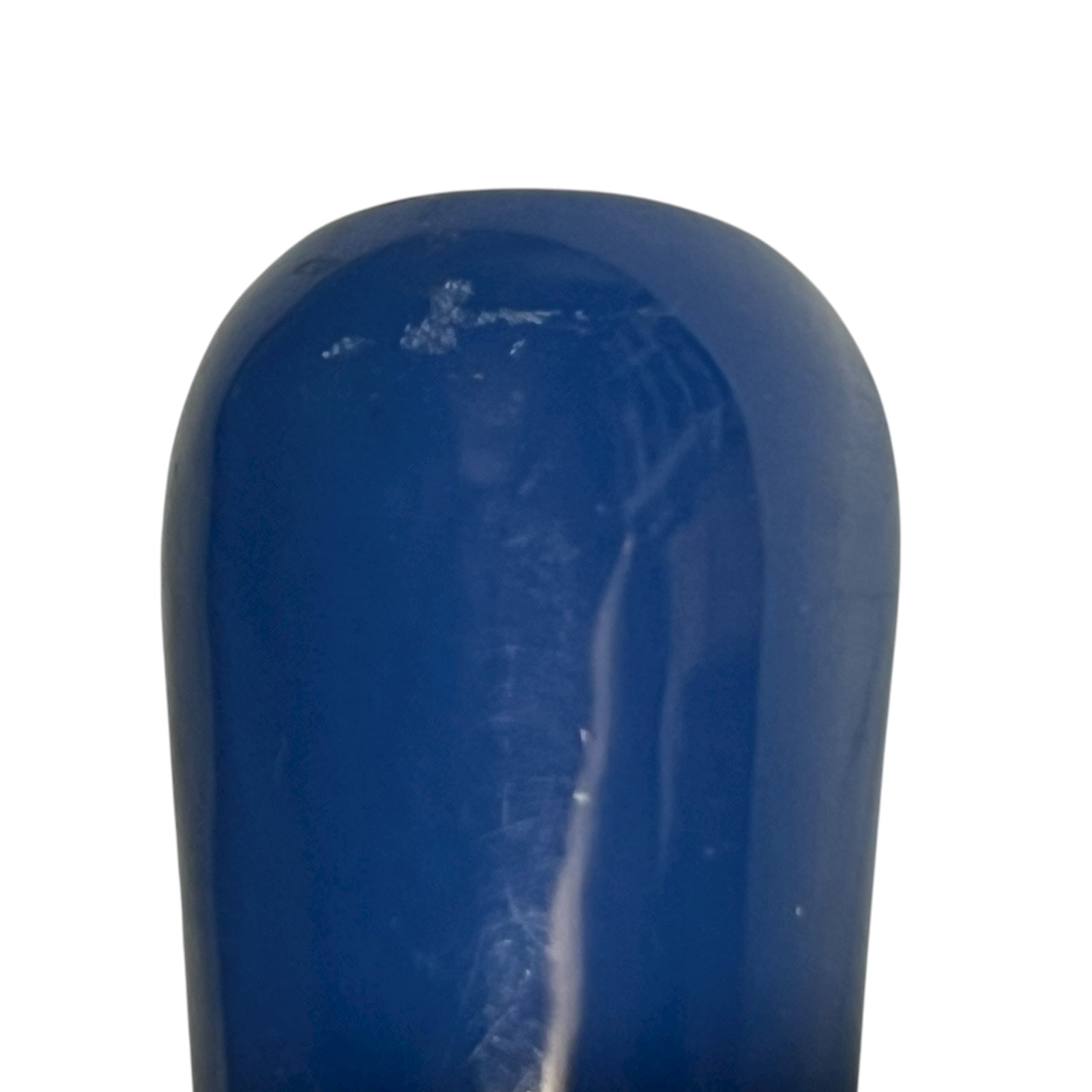 Close-up of a blue saucepan handle with a white background