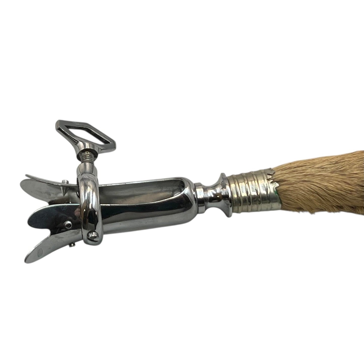 Traditional French vintage gigot with a deer hoof handle on a white background, ideal for a taxidermy collector 