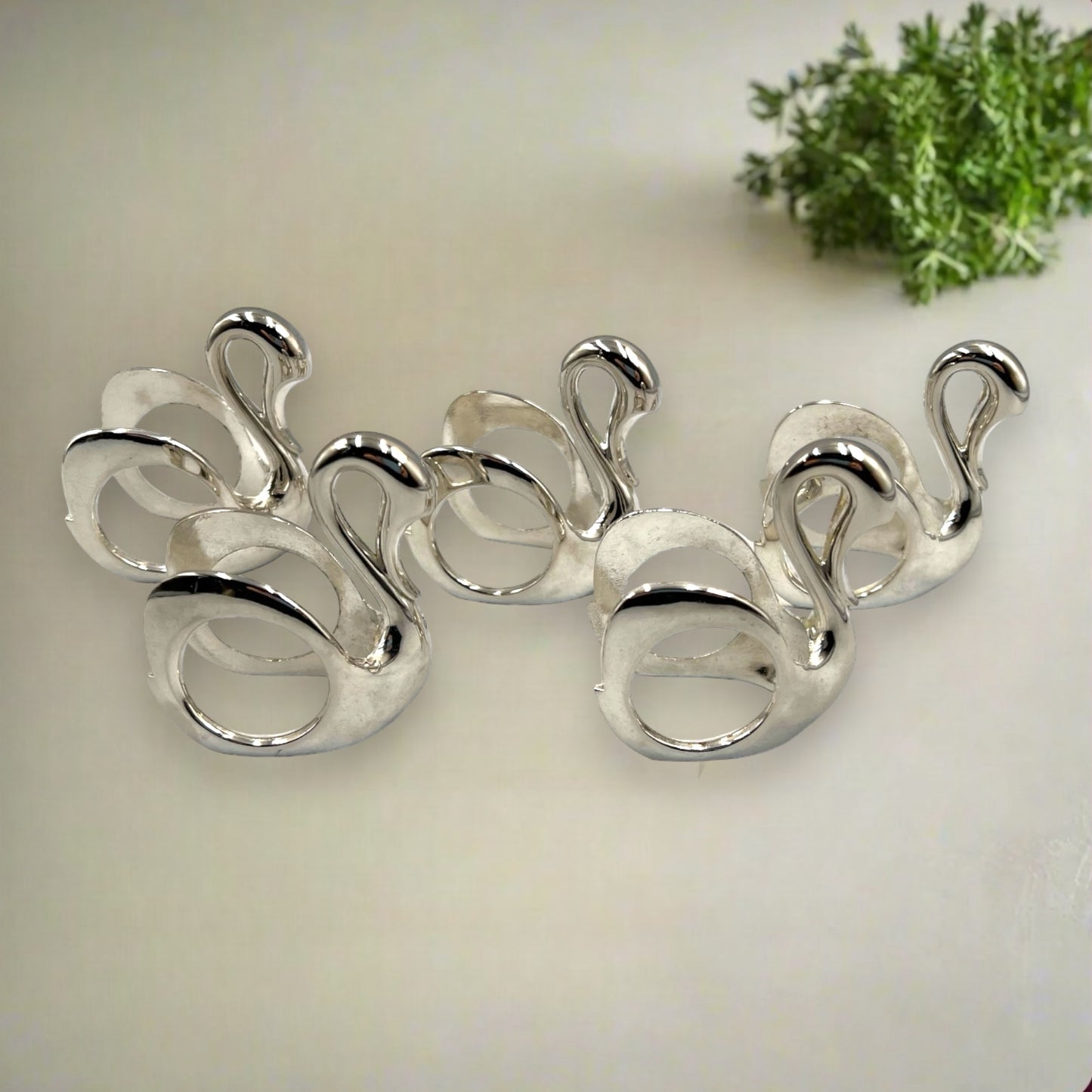 set of French silver plated napkin rings shaped as swans