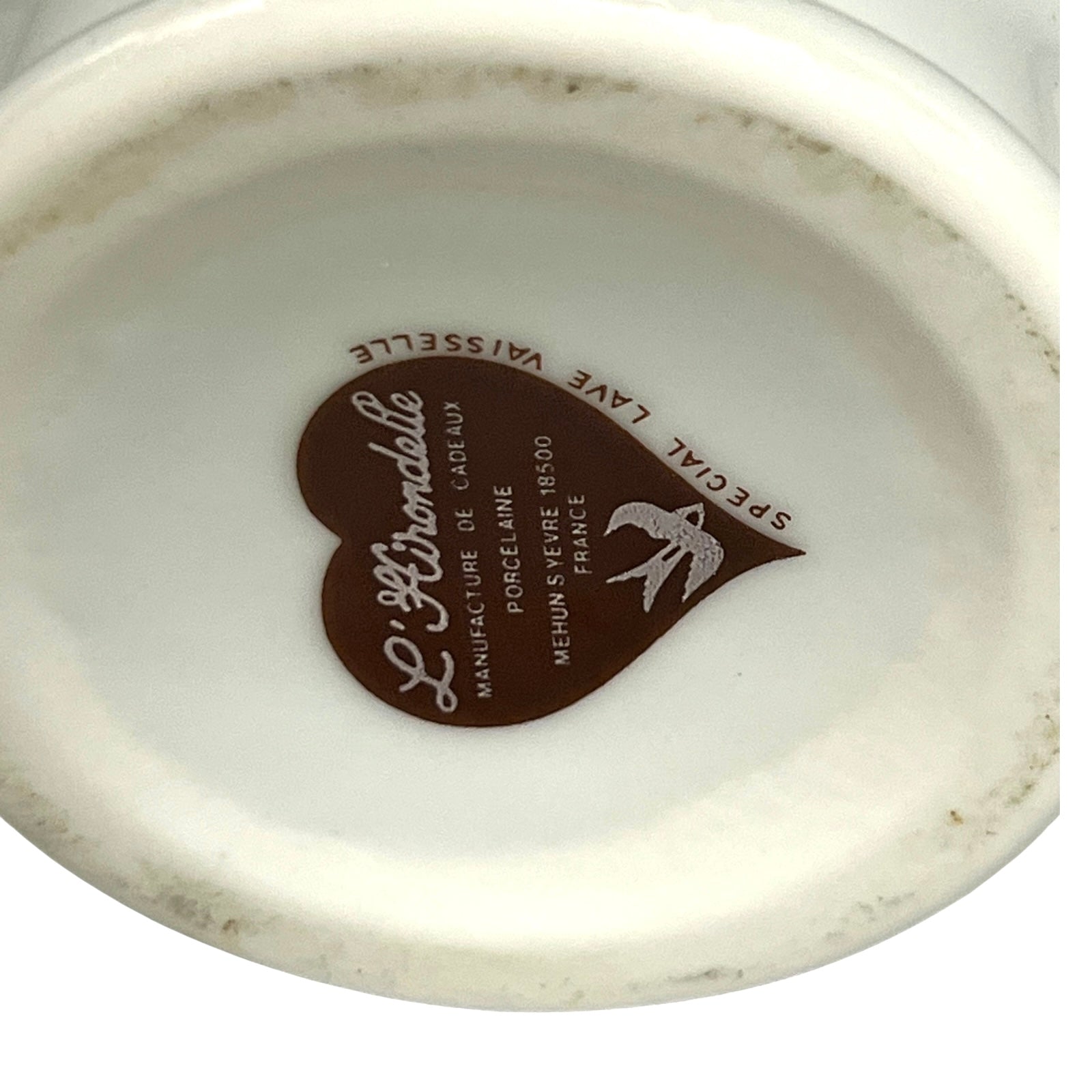 Ceramic product with a heart-shaped Hirondelle logo and text on a white background