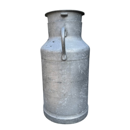 Vintage French aluminium milk churn with a lid on a white background