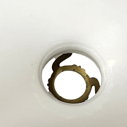 Close-up of a white shade ring 