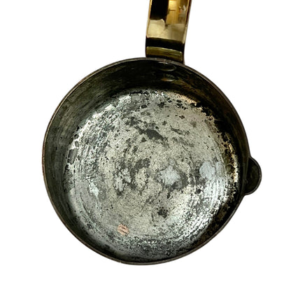 French copper ladle with a brass handle  on a white background